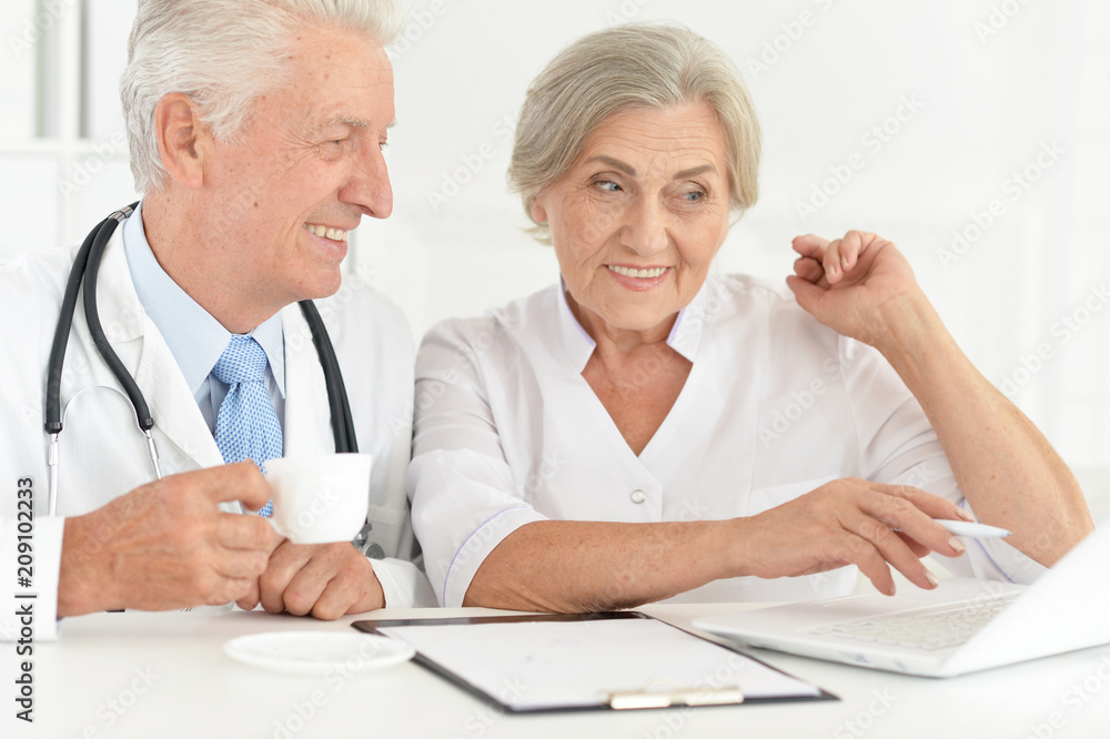 Senior doctor with a elderly patient