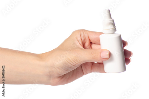 Nasal spray for nose in hand on white background isolation