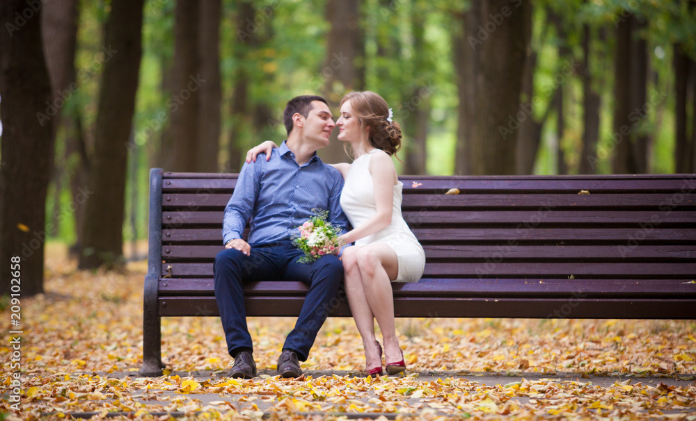 young man and woman on a walk in a park, happiness young man and woman on a walk in a park, happiness