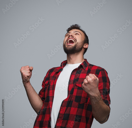 Super excited man celebrating win