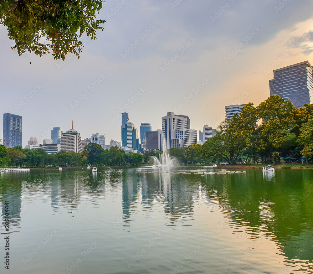 Cityscape view of public Park in evening with beautiful twilight light