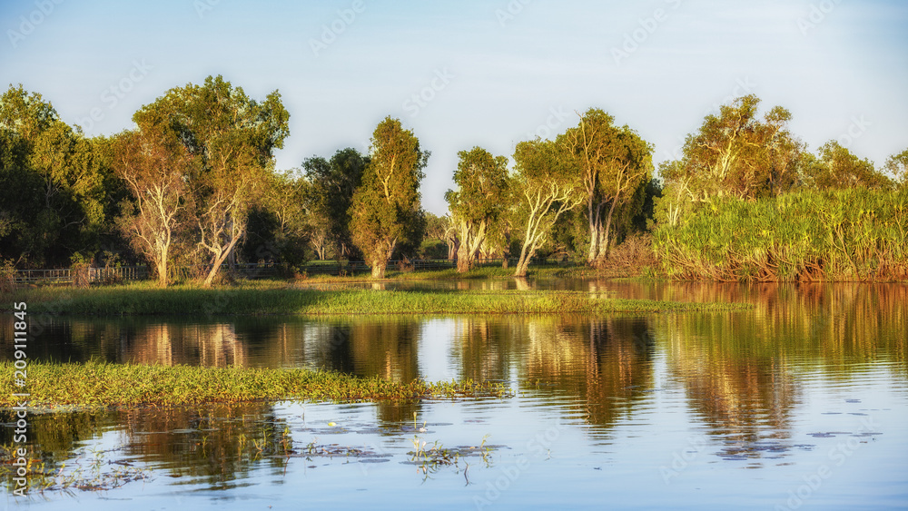 Peaceful landscape at sunrise in White water Billabong, Kakadu National Park, Northern Territory, Australia Peaceful landscape at sunrise in White water Billabong, Kakadu National Park, Northern Territory, Australia