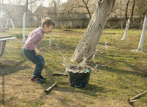  Boy playing in the garden
