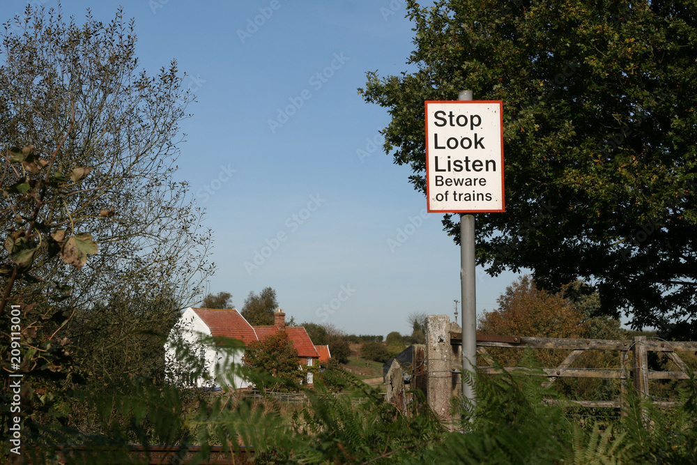 Stop Look Listen Beware of trains sign