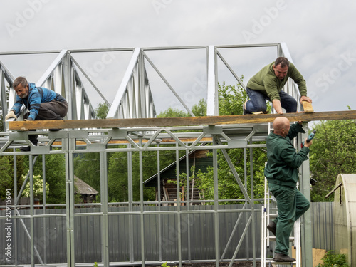 Performs roofing work.