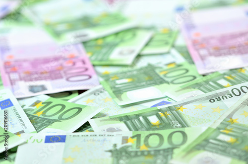 Euro banknotes texture background with limited DOF
