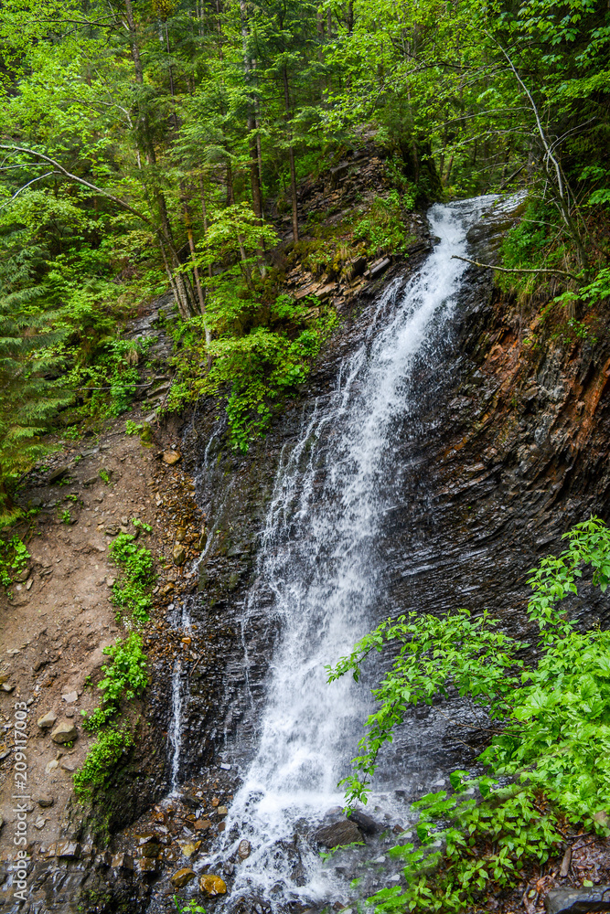 Waterfall Huk in the Carpathian mountains, Ukraine Waterfall Huk in the Carpathian mountains, Ukraine