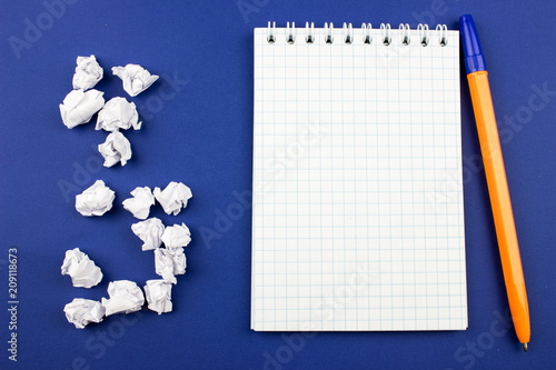 Crumpled paper ballsand notepad. Empty space for text and design.