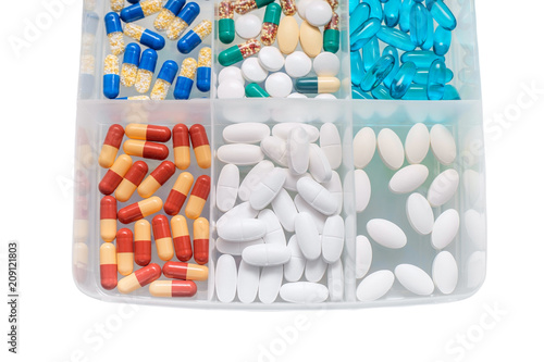 Medications in the dosage box on isolated white background