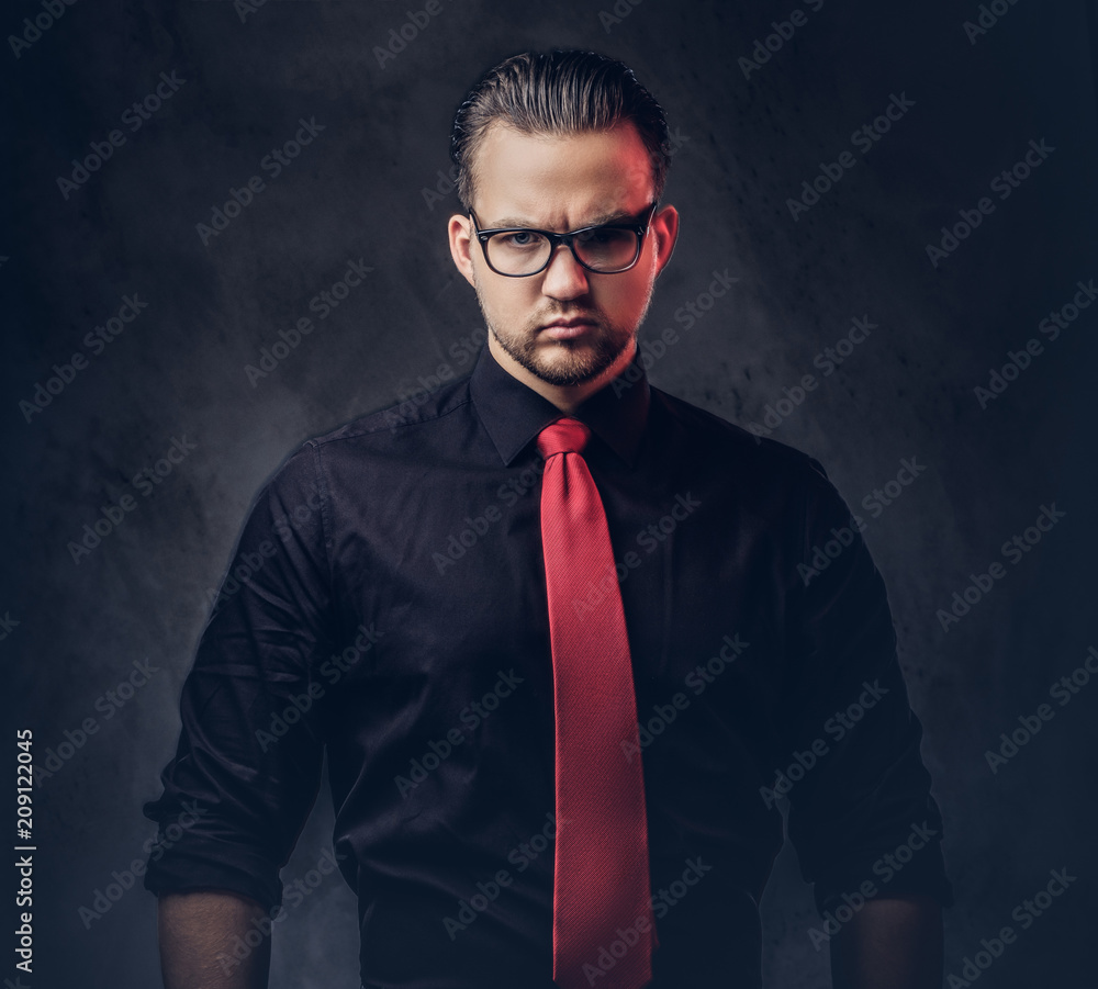 Portrait Of A Brilliant Villain In A Black Shirt With A Red Tie. Stock  Photo | Adobe Stock
