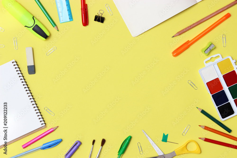 set of stationery on a colored background with space for text. back to school. office tools. flat lay, top view set of stationery on a colored background with space for text. back to school. office tools. flat lay, top view
