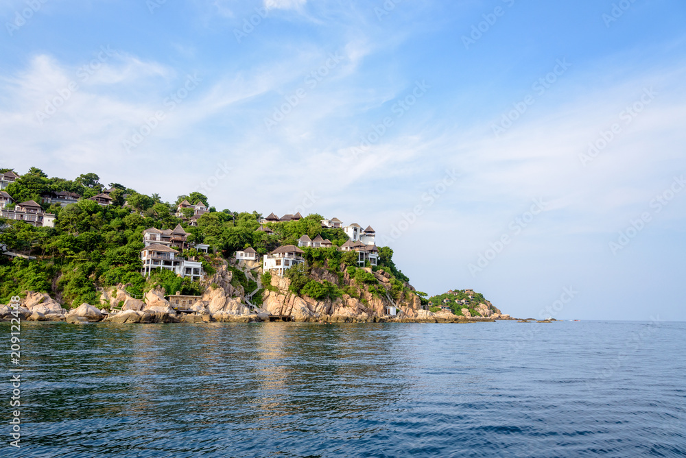 Beautiful nature landscape of villa on Shark Cape, Shark Bay area under the blue sky on the sea during summer at Ko Tao island is a famous tourist attractions in the Gulf of Thailand, Surat Thani