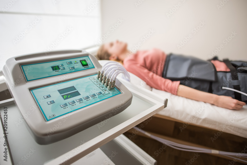 Young woman takes healthing treatments in medical center Young woman takes healthing treatments in medical center