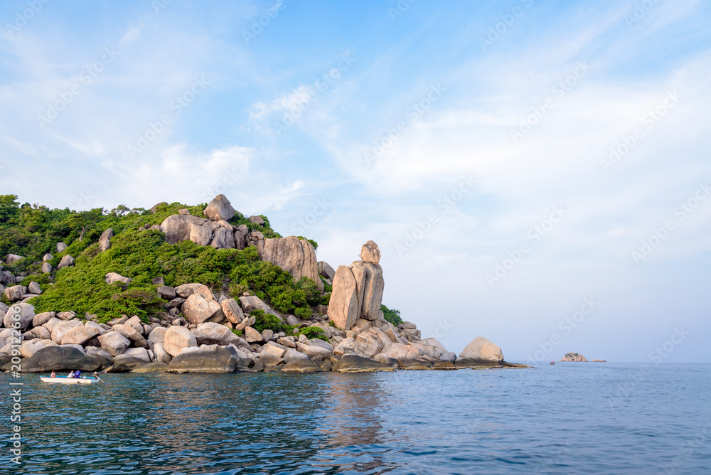 Beautiful nature landscape group exotic rock of Buddha Point at cape near John-Suwan viewpoint under the blue sky on the sea during summer, Ko Tao island is a attractions in Surat Thani, Thailand