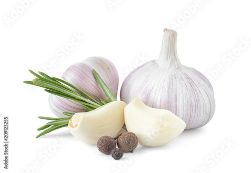 Fresh garlic, rosemary and allspice on white background