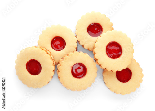 Traditional Christmas Linzer cookies with sweet jam on white background