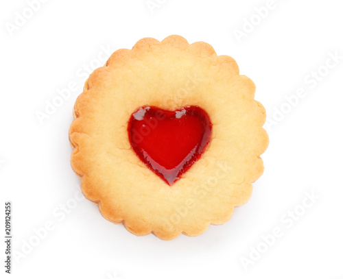 Traditional Christmas Linzer cookie with sweet jam on white background