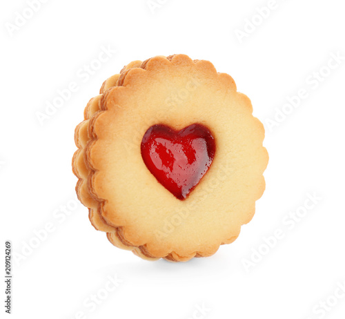 Traditional Christmas Linzer cookie with sweet jam on white background photo