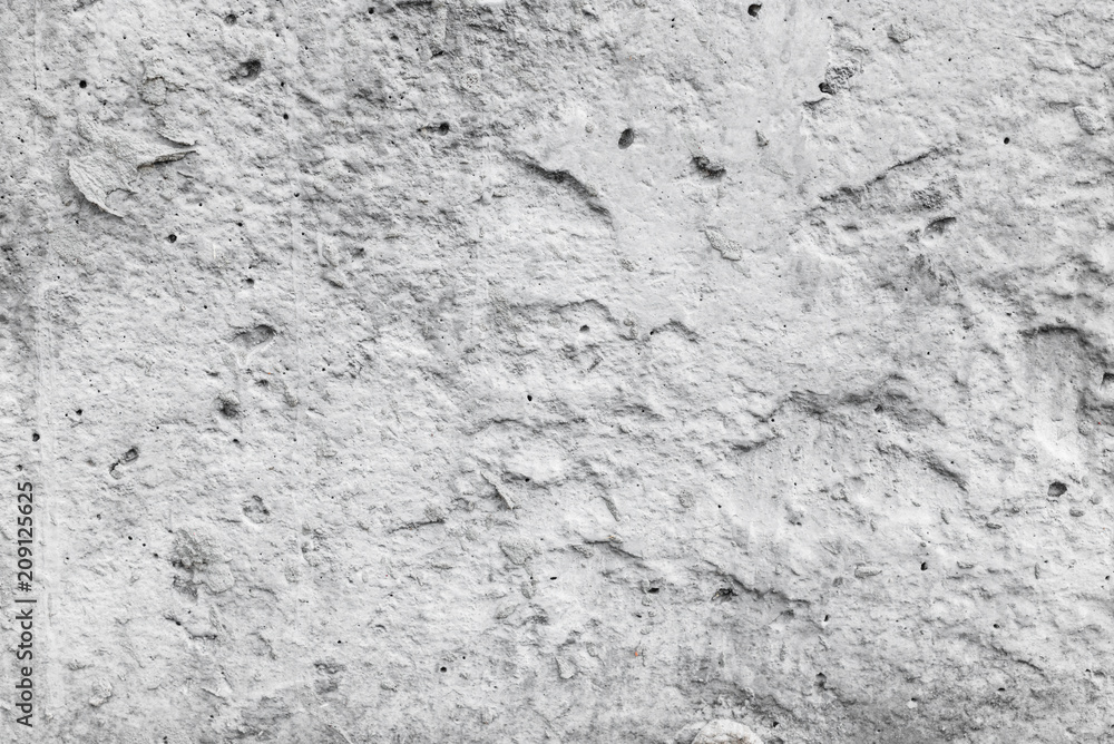 Fototapeta premium Wall fragment with scratches and cracks