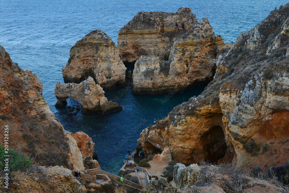 Amazing and unique cliffs formation with  sea arches, grottos and smugglers caves in Lagos, Algarve, Portugal