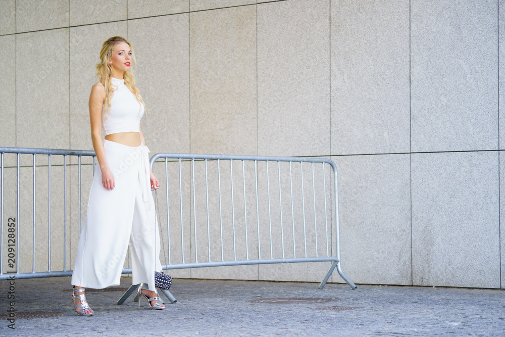 Woman wearing crop top and culottes Woman wearing crop top and culottes