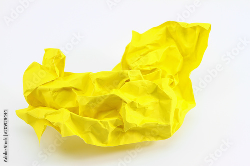 crumpled yellow paper