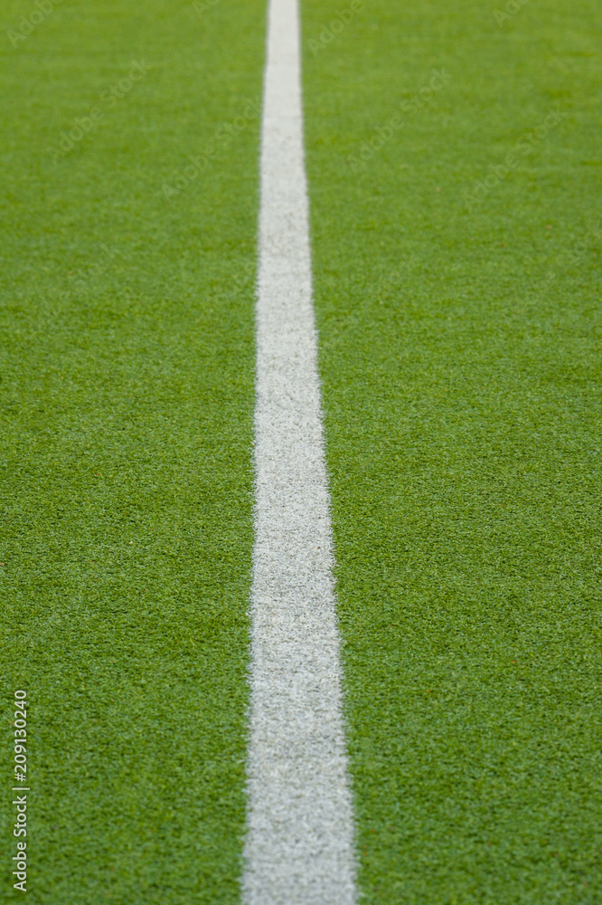 Fototapeta premium Texture of the herb cover sports field. Used in tennis, golf, baseball, field hockey, football, cricket, rugby.