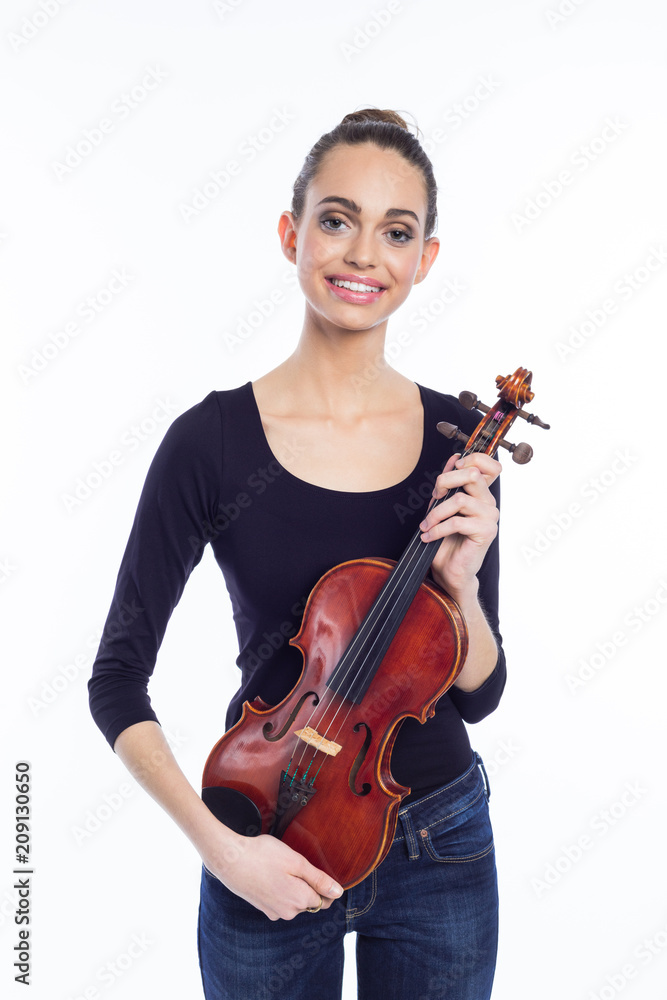 Portrait of happy young woman holding violin Portrait of happy young woman holding violin
