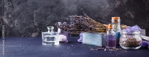 Essential lavender oil and dry lavender flowers.