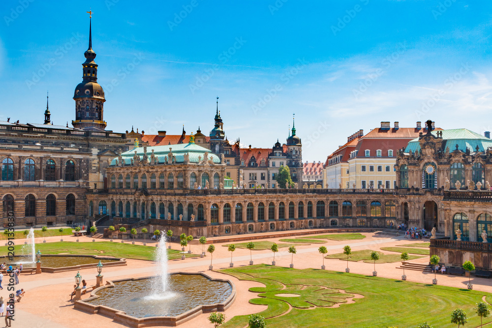 Dresden, Germany. Zwinger Palace and gallery of masters. Beautiful statues. Historic Heritage. A city for tourism and tourists. View of the Elba River. Nearby the Opera House.