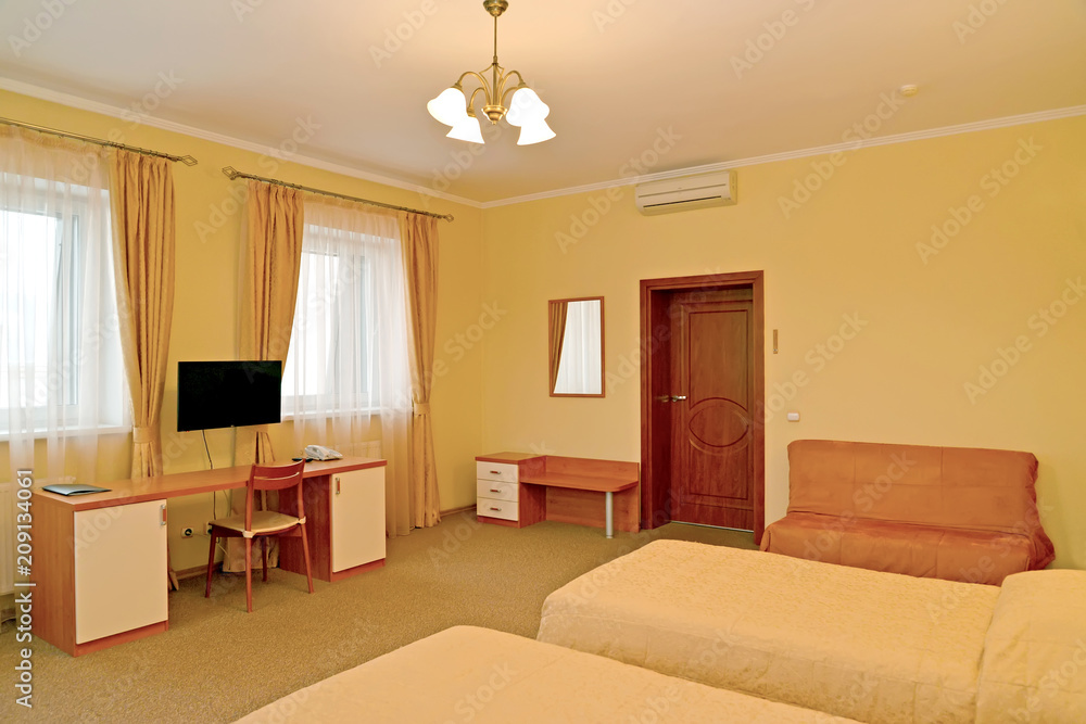 Obraz premium Interior of the hotel room in warm colors. Modern classics