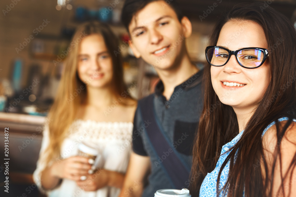 Group of friends enjoying in cafe together. Group of friends enjoying in cafe together.