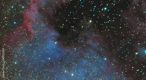 emission nebula of North America in the constellation Swan and is a region of ionized hydrogen. Photo of the nebula and the star field through the telescope system Newton