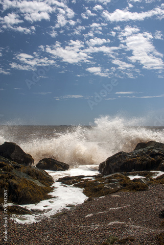 Waves Crashing Through Rocks on the Shore