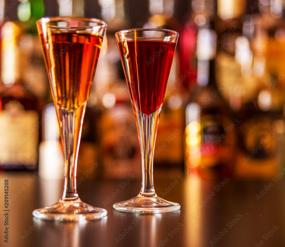 refreshing liqueur in a tall glass, alcoholic drink prepared by the bartender refreshing liqueur in a tall glass, alcoholic drink prepared by the bartender