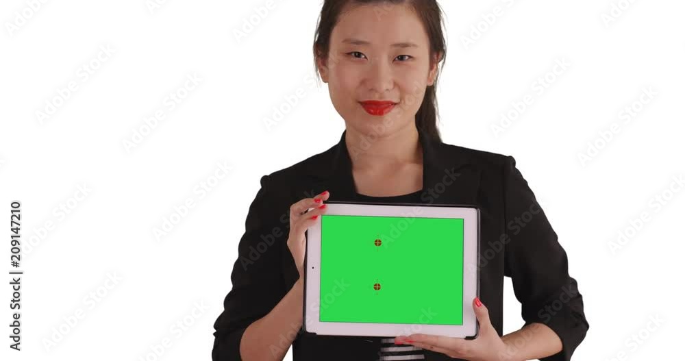 Happy millennial businesswoman holding portable tablet computer with greenscreen for copy space, Smiling business lady carrying handheld technology with green chroma key isolated on white backdrop, 4k Happy millennial businesswoman holding portable tablet computer with greenscreen for copy space, Smiling business lady carrying handheld technology with green chroma key isolated on white backdrop, 4k