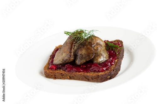 Sandwich with liver and cranberry sauce on a white background.