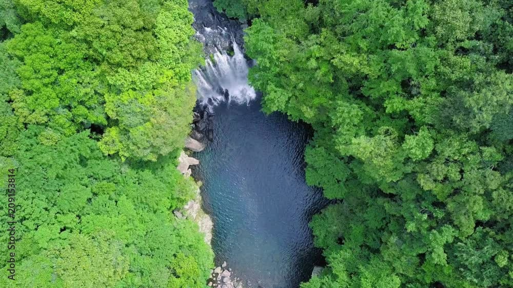 Aerial View of Cheonjeyeon Waterfall on Jeju Island, South Korea Aerial View of Cheonjeyeon Waterfall on Jeju Island, South Korea