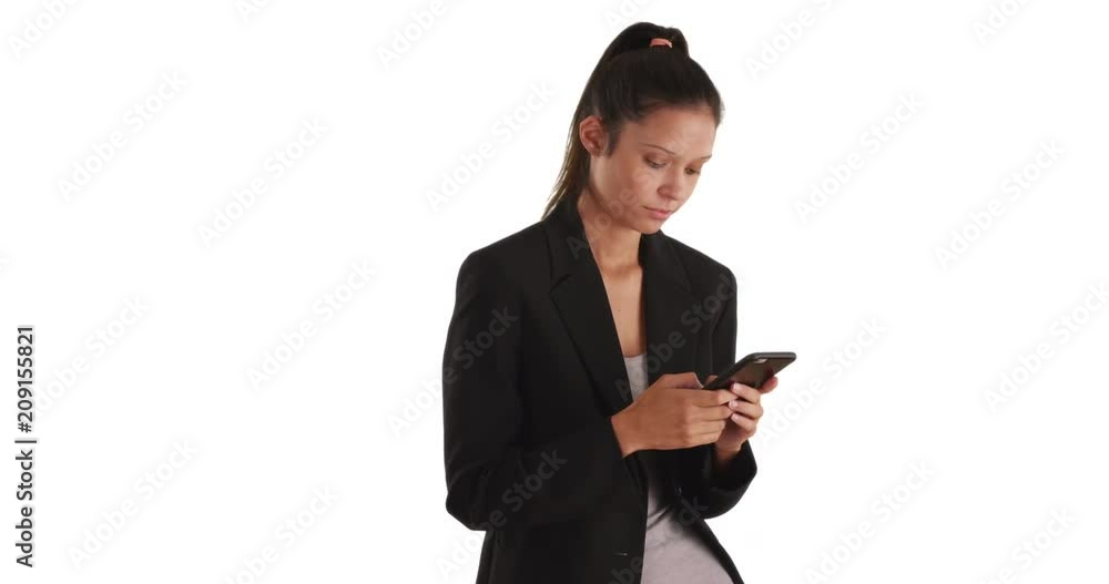 Pretty business woman texting with mobile phone on white background with copyspace, Successful young female wearing blazer messaging on smartphone with copy space, 4k Pretty business woman texting with mobile phone on white background with copyspace, Successful young female wearing blazer messaging on smartphone with copy space, 4k
