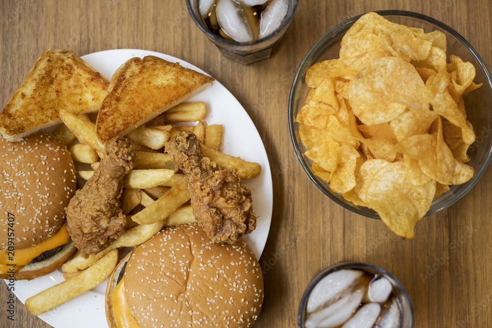 Naklejka premium Fattening and unhealthy fast food
