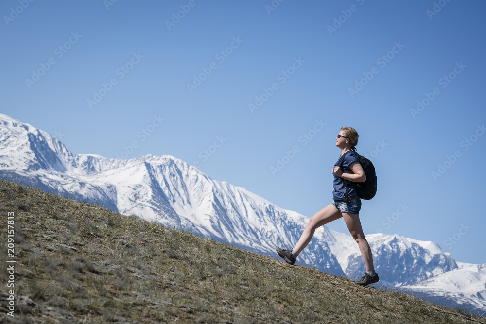 Profile of a traveler who climbs a mountain. Profile of a traveler who climbs a mountain.