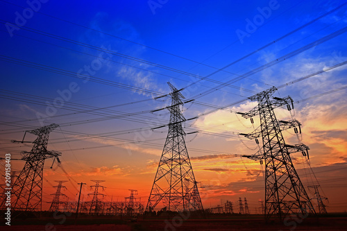 Electric tower, silhouette at sunset