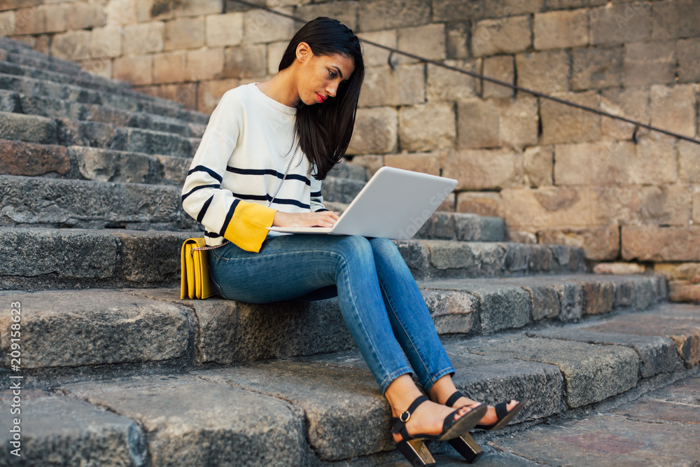 Stylish woman in the city.