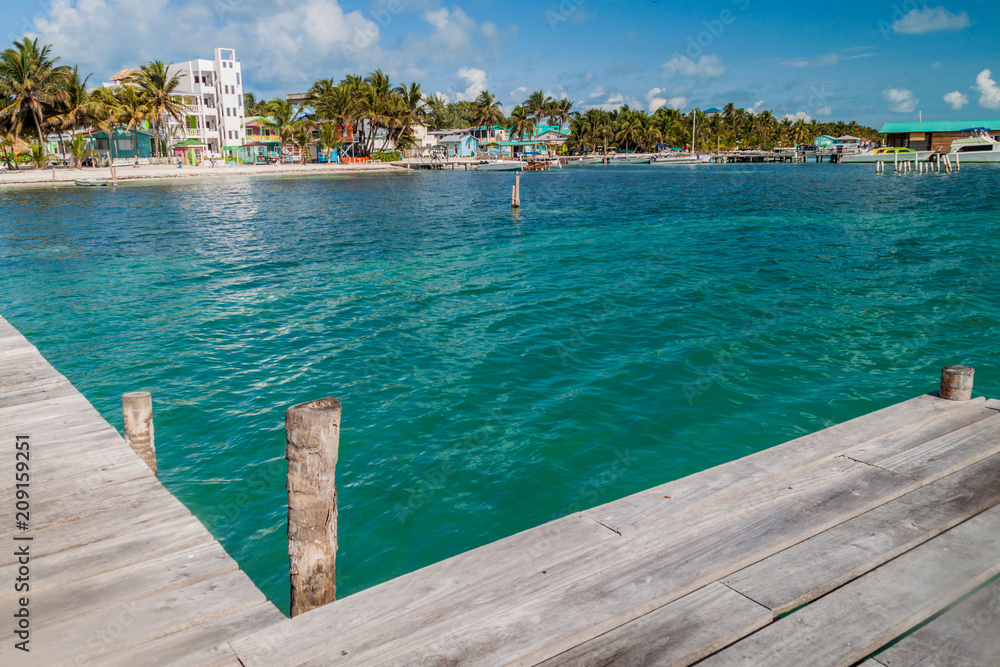 View of Caye Caulker village from a wooden pier, Belize