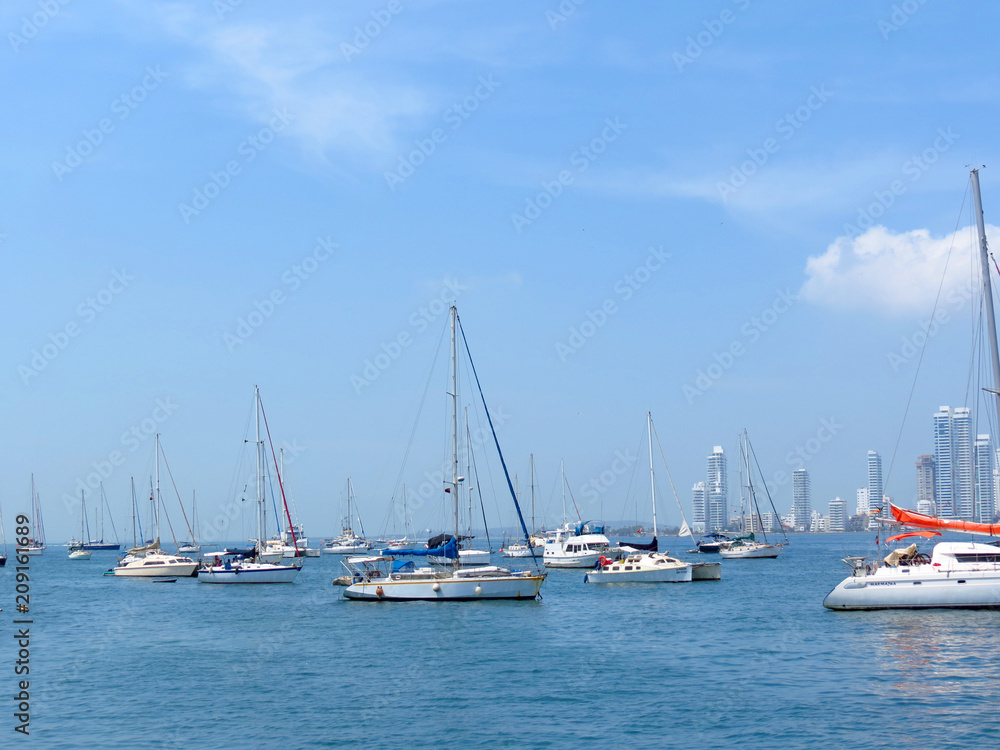 Panoramic view of the coastline of the city and the sea with blue sky with some boats or ships   