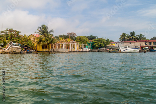 Boats and houses in Livingston village, Guatemala