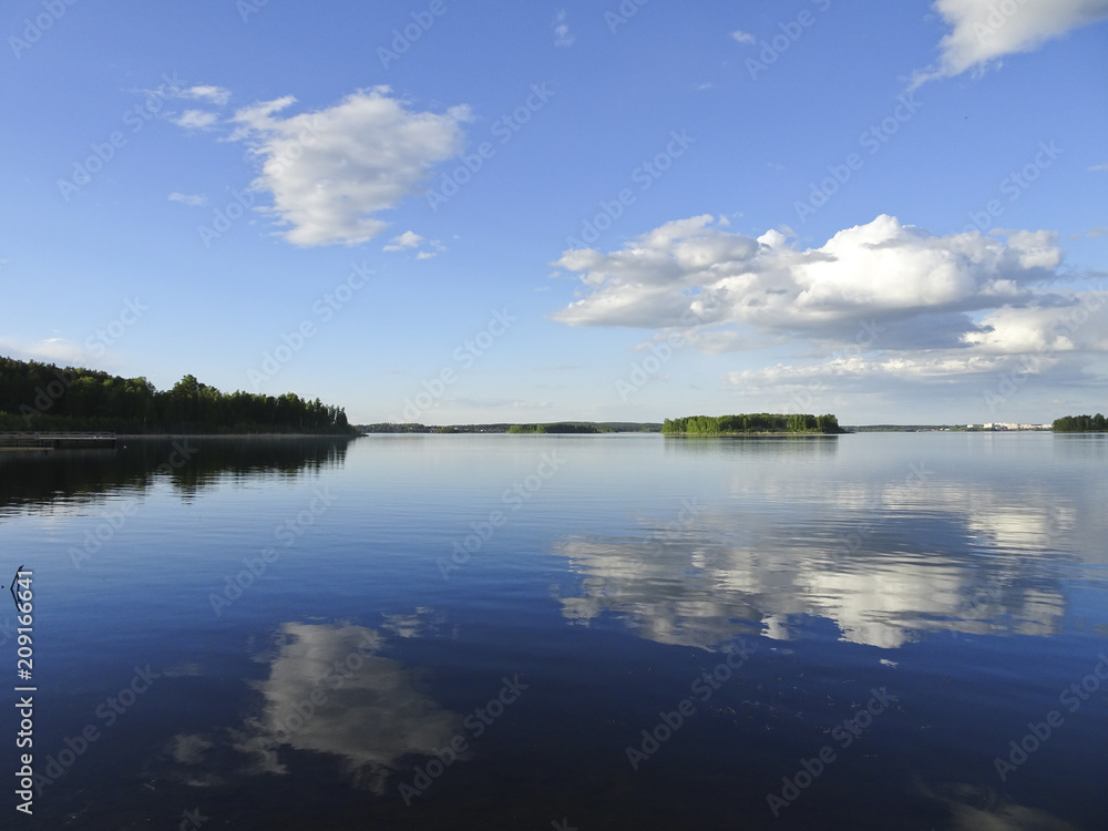 Summer landscape: a serene Sunny day on the lake