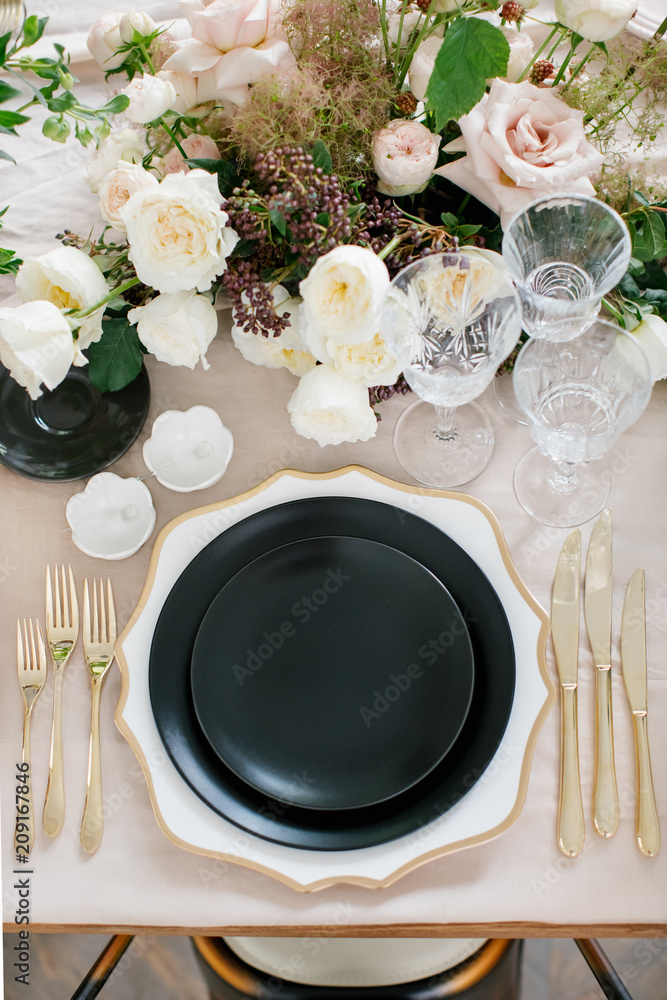 Black and gold table setting Stock Photo | Adobe Stock