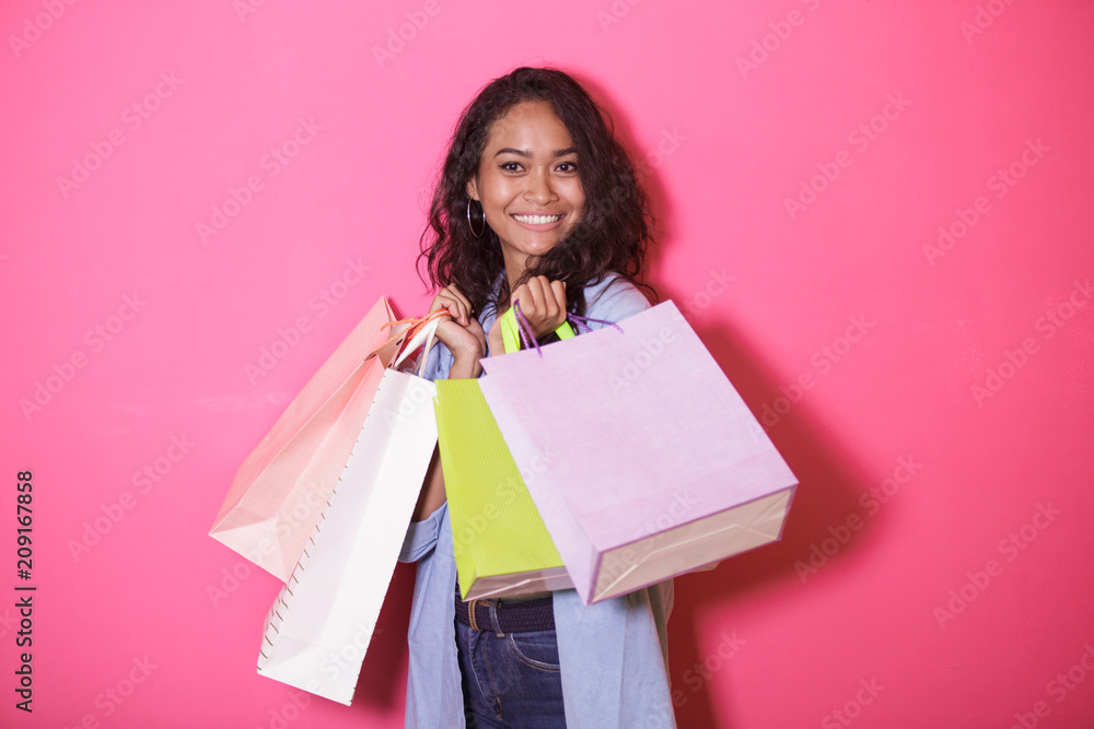 happiness of asian woman bringing shopping bag