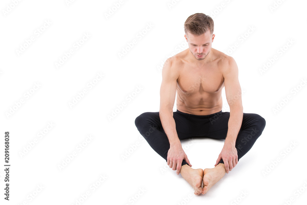 Yoga and a healthy lifestyle. Sexy man. White background. Yoga and a healthy lifestyle. Sexy man. White background.